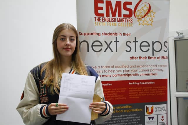 Taylor Measor receives her A-level results from English Martyrs Sixth Form College. Picture by Steve Hope