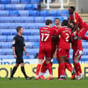 Marc Bola of Middlesbrough celebrates with team-mates after scoring against Reading.