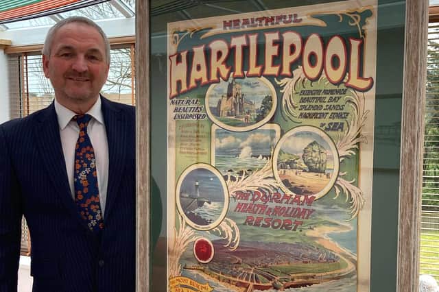 Stephen Close with the original 1906 Healthful Hartlepool poster he is auctioning off.