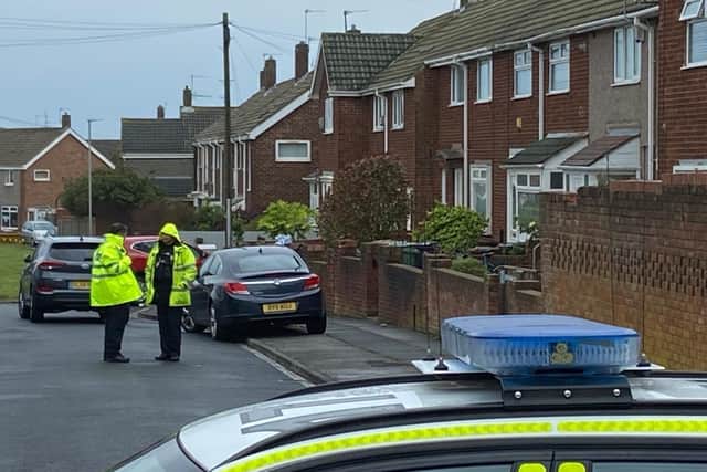 The street was sealed off with marked cars as Cleveland Police carried out checks.