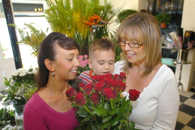 Emma-Jayne McIntyre pictured alongside her son Bailey and mum Heather at The Secret Garden flower shop in 2009.