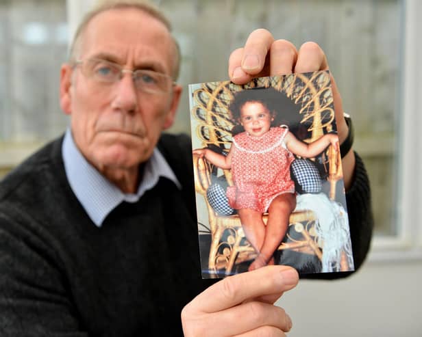 Richie Lee at home in Hartlepool with a photograph of Katrice Lee aged 18 months.