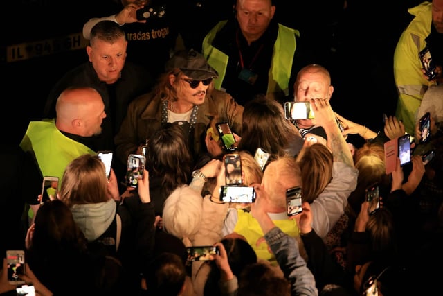 Johnny Depp was spotted signing autographs for fans. Picture: North News.