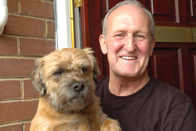 Alan Hepworth poses for a photo with his dog Barnie in 2008.