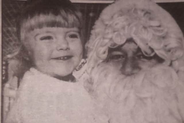 Getting to meet Santa at Jacksons Landing in 1995 was Jasmine Laura Graham.