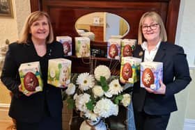Meynell & Mason funeral service arrangers Carole Lester and Julia Masshedar with some of the Easter eggs donated to their annual collection so far.