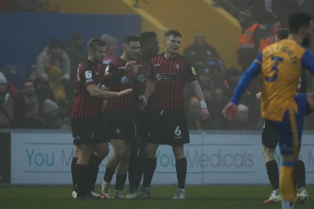 Luke Molyneux celebrates his goal against Mansfield Town. (Credit: Will Matthews | MI News)