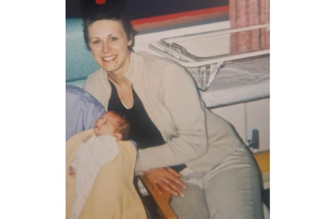 Kim with her her first grandchild, Stephanie.