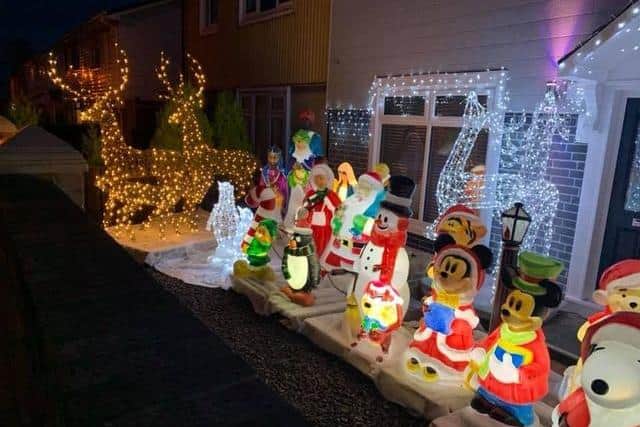 From Jesus to Mickey Mouse, Jack Richardson has dozens of light-up ornaments on display outside his house