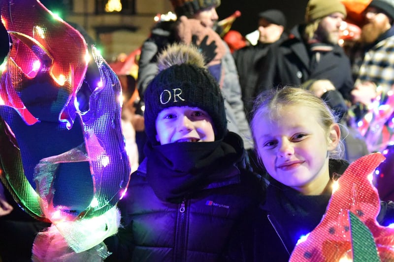 The cold didn't bother these happy youngsters taking part in Friday's lantern parade. Picture by BERNADETTE MALCOLMSON