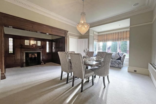 The dining room is to the centre of the house and has a south facing bay window, as well as a mahogany fireplace.