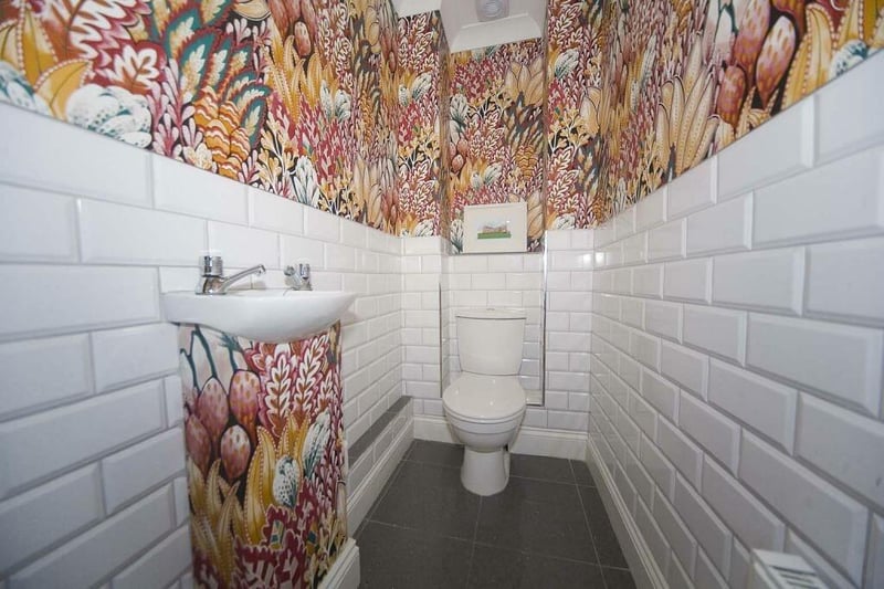 Eye catching decor in this loo.