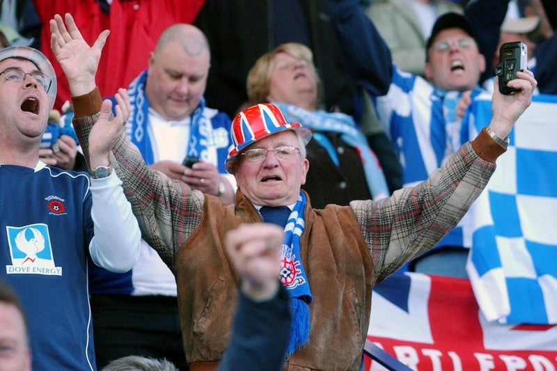 A Poolie leads the singing at Tranmere Rovers in the League 1 play-off semi-final second leg in 2005.