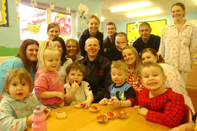 Kids at Kiddicare celebrate Comic Relief in 2005 by eating specially-made cupcakes.