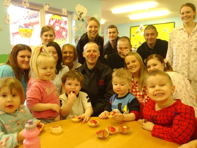 Kids at Kiddicare celebrate Comic Relief in 2005 by eating specially-made cupcakes.