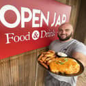 Joe Franks owner of The Open Jar is giving away free Parmos after England's defeat in the football. Picture by FRANK REID