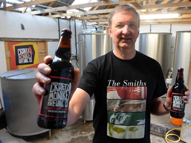 Crafty Monkey Brewing Company director Gary Olvanhill with the new Cemetery Gates beer, named in honour of The Smiths song Cemetry Gates.