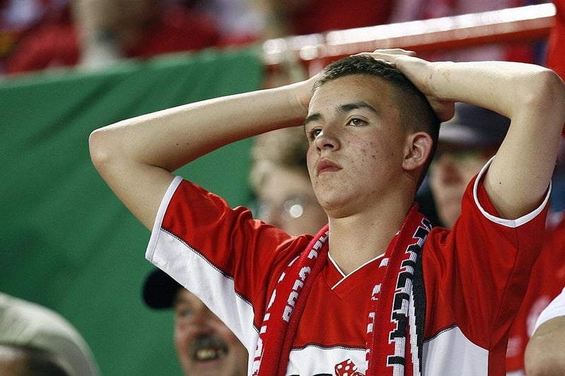 Dejection for Boro fans after defeat to Sevilla.