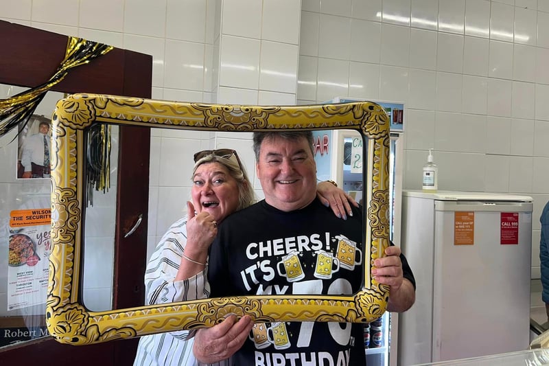 Customers, friends and family come to Robert Moore's Butchers to say happy 70th birthday to Robert Moore.