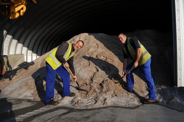 Council workers John Rowbotham and Andy Leight collect salt at the Brenda Road salt barn in 2011.
