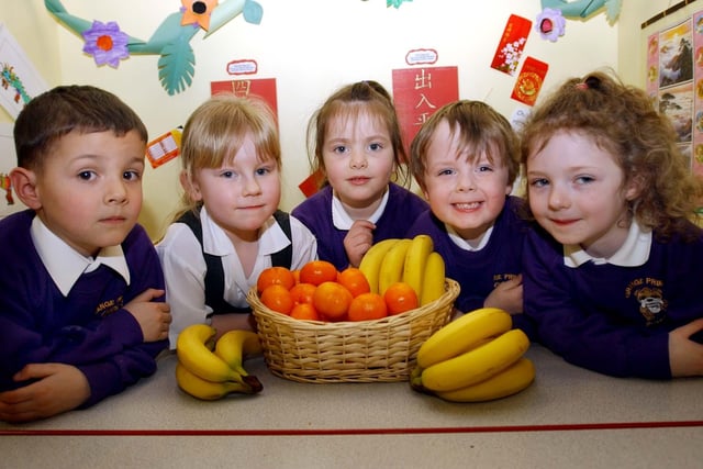 Pupils at Grange Primary School are given free fruit in 2004.
