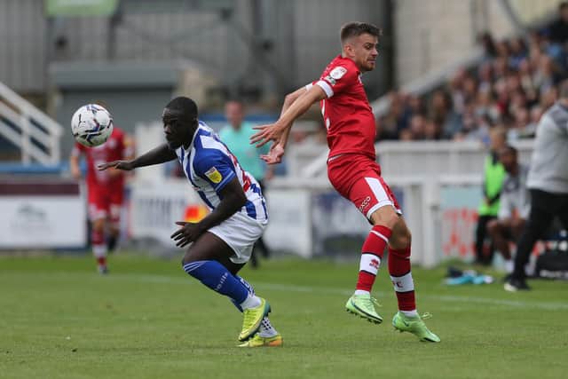 Olufela Olomola of Hartlepool United in action with Crawley Town's Archie Davies during the Sky Bet League 2 match between Hartlepool United and Crawley Town at Victoria Park, Hartlepool on Saturday 7th August 2021. (Credit: Mark Fletcher | MI News)