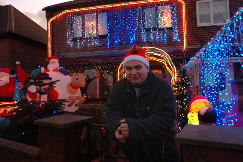 Tommy Clogg shows off his Christmas decorations.
