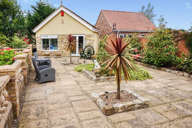 Outside extensive gardens to front and rear. Detached triple garage (could be converted into separate living accommodation subject to obtaining planning approval) with double width driveway providing parking for many cars, caravan, boat or motorhome.