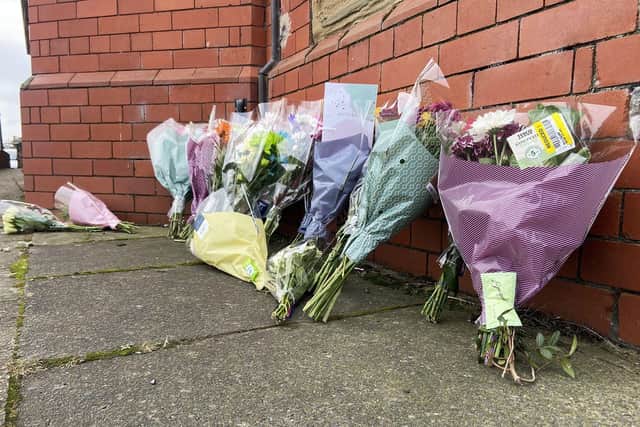 Flowers left by well wishers on Raby Road.  Picture by FRANK REID
