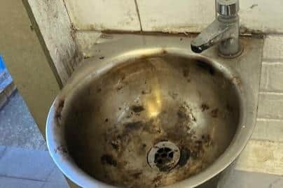 Damage to a sink in Rossmere Park toilets after someone started a fire.