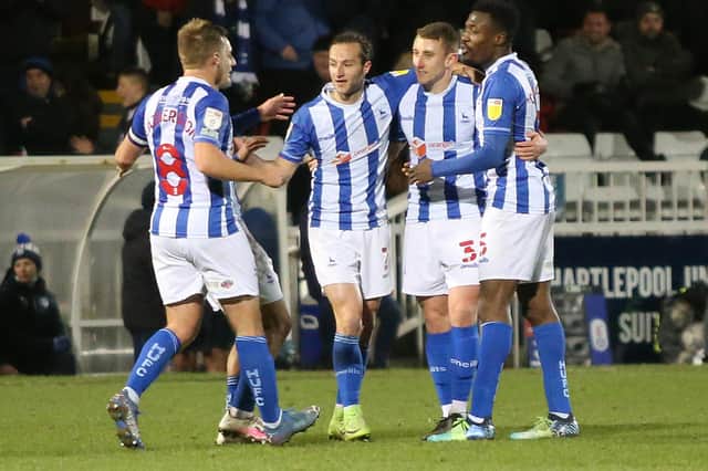Hartlepool United players celebrate after taking the lead against Tranmere Rovers. (Credit: Harry Cook | MI News)