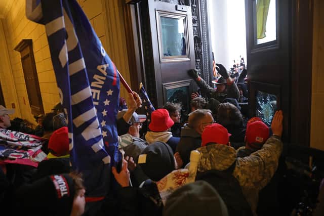 Protesters supporting U.S. President Donald Trump break into the U.S. Capitol.  (Photo by Win McNamee/Getty Images)