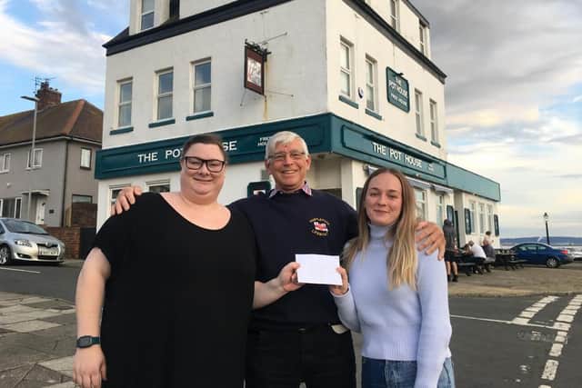 Hartlepool RNLI Chairman Malcolm Cook pictured with Pot House staff Jess Naylor (left) and Eve Gooding. Picture Tom Collins.