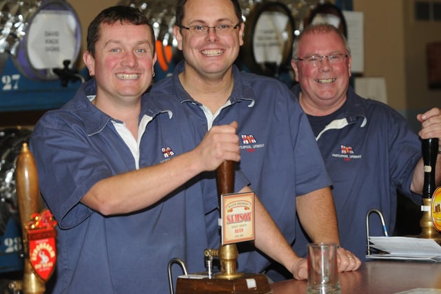 Hartlepool RNLI volunteer crew members Ed Mason, Phil Hope and Mike Craddy serve beer at the beer festival in 2010.