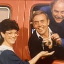 Ian St John and Jimmy Greaves hand over the keys for the new minibus to Warren Road Adult Training Centre Manager Kath Spellman in March 1987.