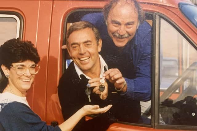 Ian St John and Jimmy Greaves hand over the keys for the new minibus to Warren Road Adult Training Centre Manager Kath Spellman in March 1987.