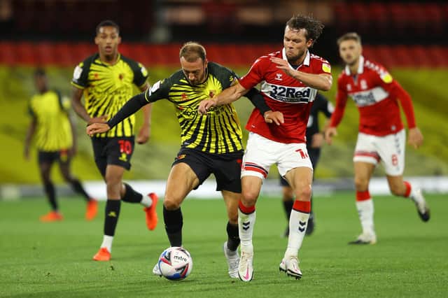 WATFORD, ENGLAND - SEPTEMBER 11: Glenn Murray of Watford battles for possession with Jonathan Howson of Middlesbrough during the Sky Bet Championship match between Watford and Middlesbrough at Vicarage Road on September 11, 2020 in Watford, England. (Photo by Richard Heathcote/Getty Images)