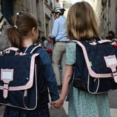 It can be daunting for some children going back to school after a long, summer break. Photo by Emmanuel Dunand via Getty Images