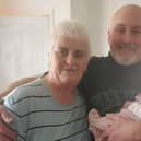 Ally with her partner Shaun Mathieson and a member of their extended family in 2024.
