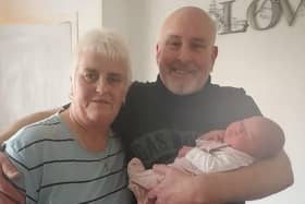 Ally with her partner Shaun Mathieson and a member of their extended family in 2024.