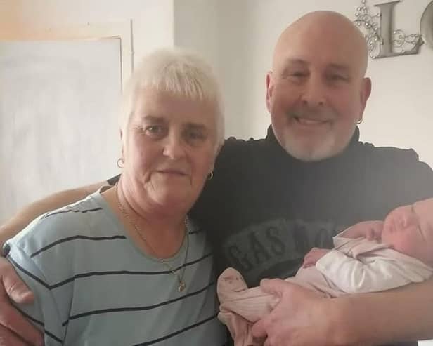 Ally with her partner Shaun Mathieson and a member of their extended family in 2024.