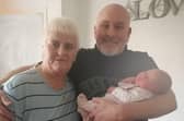Ally with her partner Shaun Mathieson and a member of their extended family in 2024.