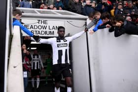 Enzio Boldewijn of Notts County high fives fans. (Photo by Laurence Griffiths/Getty Images)