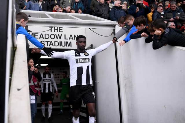 Enzio Boldewijn of Notts County high fives fans. (Photo by Laurence Griffiths/Getty Images)