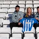 Hartlepool footballers Jack Hunter and Jamie Miley with University Hospitals Tees’ education and training partner Teresa Pounder.