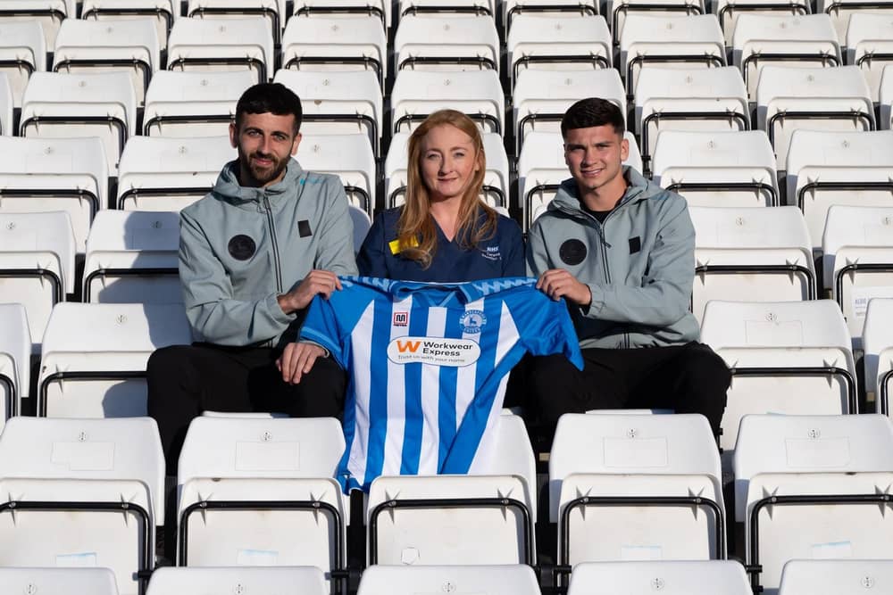 Hartlepool footballers Jack Hunter and Jamie Miley with University Hospitals Tees’ education and training partner Teresa Pounder.