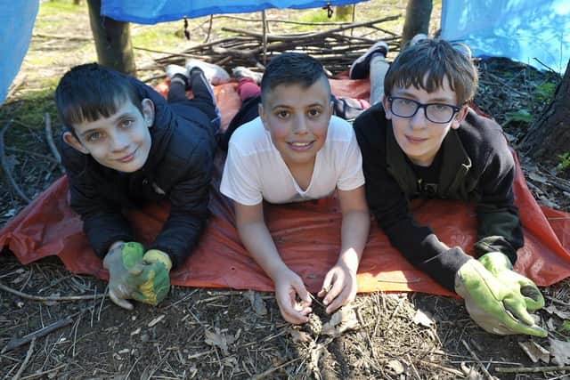 Camping (left to right) Thomas Nicholson, Ashton Abdlah and Tyler Anderson in the tent they made at Summerhill Country Park.  Picture by FRANK REID