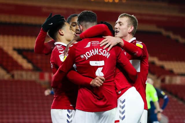 Middlesbrough players celebrate after scoring against Derby.