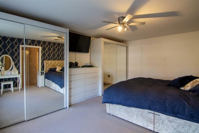 This large double bedroom features an en suite.