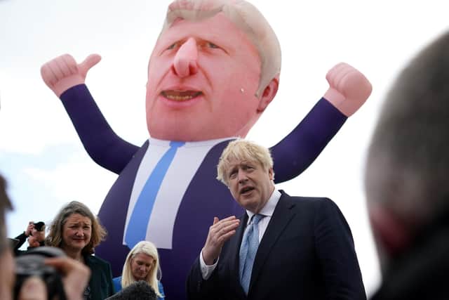 Prime Minister Boris Johnson next to a giant inflatable of himself during a visit to Hartlepool after Conservative candidate Jill Mortimer won the Hartlepool by-election in May.
